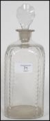 A 18th century Georgian spirit decanter having an etched armorial shield crest with monogram to