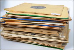 A collection of early 20th century 78 rpm records of varying genres and labels.