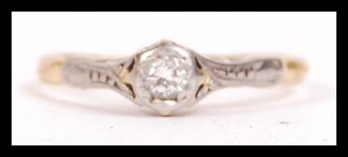 A hallmarked 18ct gold and diamond solitaire ring. Hallmarked for Birmingham, the diamond approx
