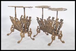 A pair of cast mid century Italian ornate ormolu side table magazine racks / plant stands side