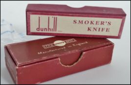 A vintage 20th century Dunhill cigar holder cheroot of tapering form complete in the original box