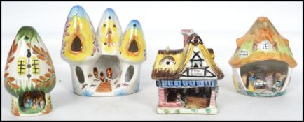 A group of three charming children's bedside night lights by Derrick Fowler together with a