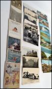 A collection of vintage postcards dating from the early 20th century to include comic, military