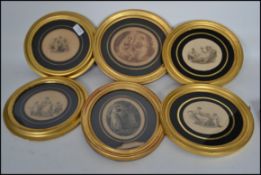 A group of six early 19th century gilt framed and verre eglomise engravings tondos depicting neo
