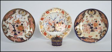 A group of four 19th century Royal Crown Derby ceramics to include an inkwell, Imari plates etc.