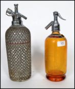 An early 20th Century Czech made mesh covered soda syphon together with a vintage 20th century