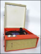 A vintage 20th century two tone portable four speed Westminster Fidelity record player together with