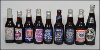 A collection of approx 50 vintage commemorative silver Jubilee beers to include various names and