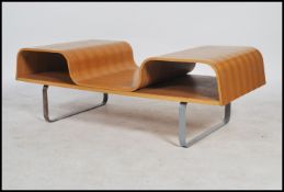 A retro 20th century veneered bentwood coffee table having sloped centre with raised sides and