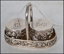 A pair of Continental silver salt and pepper cruet