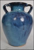 A large 20th century studio art pottery three hand