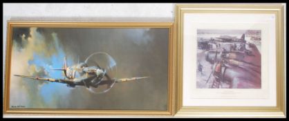 A framed picture print of a Super Marine Spitfire