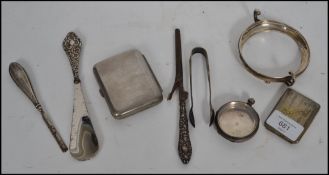 A collection of hallmarked silver and silver plated items to include a silver pocket watch case,