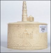 A 19th century lidded ivory tobacco pot having cha