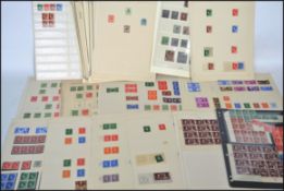 Stamps. Range from KGV-QEII. Mostly mint with strength in George V issues on album pages.High cat