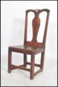 An 18th century north country oak dining chair hav