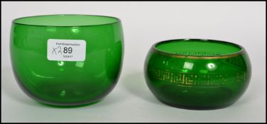 Two Georgian Bristol green glass finger bowls one