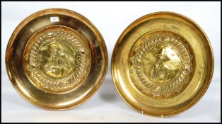 A pair of 20th century large wall hanging brass ch