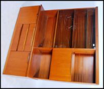 A 1970's teak wood bow fronted Danish influence hi