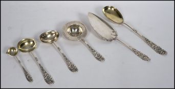 A collection of Danish Silver Plated serving spoon