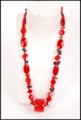 A vintage red glass, garnet and coral necklace wit