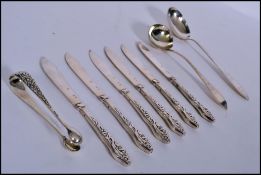 A collection of 6 Danish Silver Plated fish knives