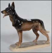 A German Hertwig ceramic figurine of German shephe