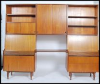 A stunning 1960's teak wood modular wall system in