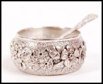 A rococo silver table salt together with a rococo
