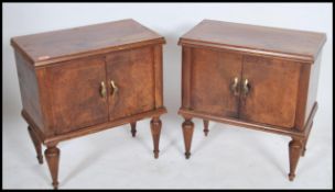 A pair of early 20th century Italian walnut bedsid