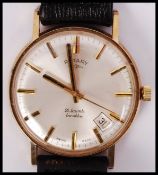 A 9ct gold hallmarked Rotary 21 jewels incabloc swiss movement with baton numerals and angled date