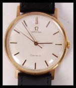 A vintage Omega Geneve Swiss made wristwatch having baton numerals Omega crown winder and