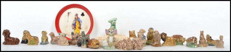 A good collection of vintage Wade Whimsies to include Jerry the mouse, wade queen of clubs dish,