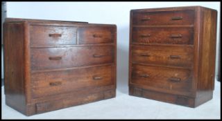 2 early 20th century Air Ministry style oak chests of drawers, each with horizontal pull handles