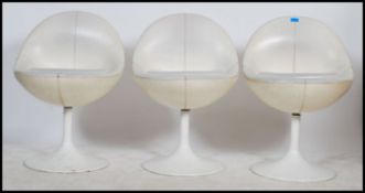 A set of three good Arkana style enamel painted metal tulip chairs being egg shaped and