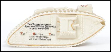 An early 20th century crested ware First World War WWI tank by Carlton China bearing crest for