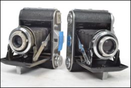 A vintage Ensign Selfix  1620 bellows camera together with another Epsilon 1620 Ensign . each with
