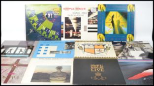 A collection of eleven long play LP vinyl records by Simple Minds to include Celebration, New Gold