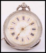 An early 20th century continental 825 silver marked ladies open faced pocket fob watch. Rococo chase