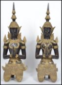 A pair of vintage 20th century ormolu Buddhas / Bodhisattva modelled in a kneeling praying