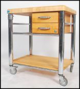 A contemporary 20th century Italian made butchers block. The heavy solid block being raised on