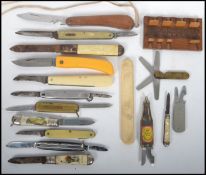 A collection of 14 vintage pens knives along with a Whist marker and an ivorine knife sharpener.