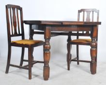 A 20th century oak utility type draw leaf refectory dining table raised on shaped legs together with