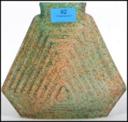 A vintage 20th century studio art glass vase of shaped art deco stepped form with a painted