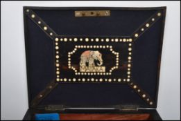 A 19th century porcupine quill work ebony and bone inlaid box with hinged lid opening to reveal a