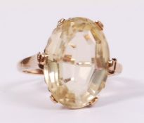 A vintage 9ct gold and citrine coloured large stone set to a claw and chevron mount. Stamped 9ct