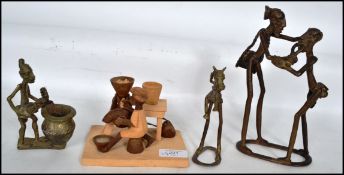 A group of three African brass sculptures to inclu