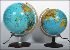 A retro 1970's Danish made Scan Globe terrestrial illuminated globe, supported by a chrome jibb on a