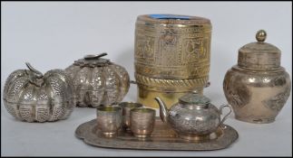 A collection of indian silver plated wares to include caddy, liqueur shot set with tray, cylindrical
