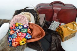 A large collection of vintage 20th clothing and fashion to include fur coats, hats, handbags and